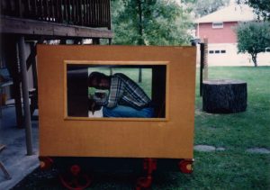 dad_in_tiny_traincar